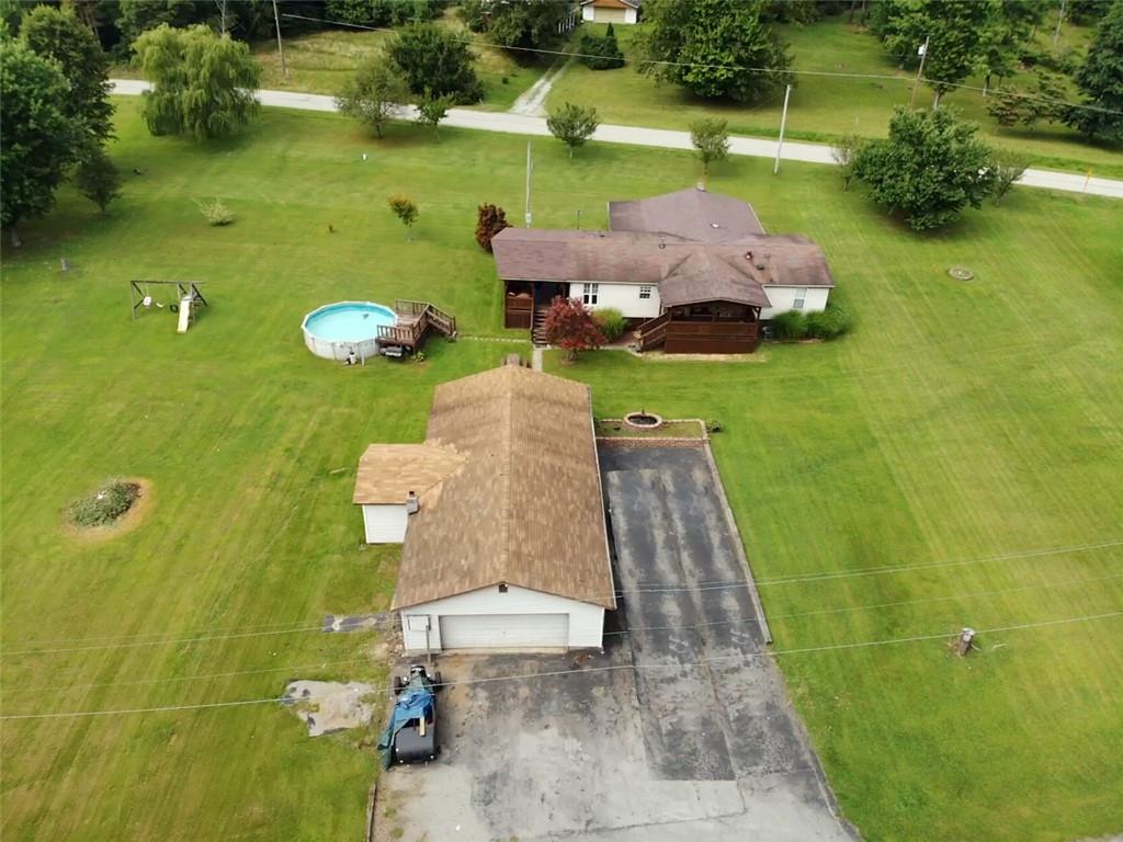 1199 Banning Road Dawson, PA 15428 - Photo 2 of 24 an aerial view of a house with a yard