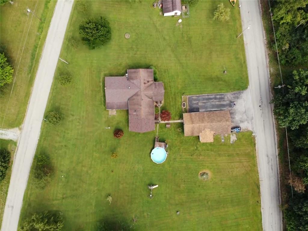 1199 Banning Road Dawson, PA 15428 - Photo 3 of 24 an aerial view of a house with a yard