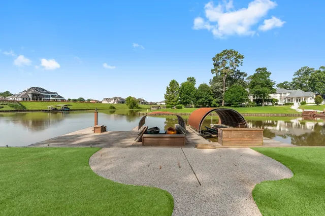 a view of a lake with a yard