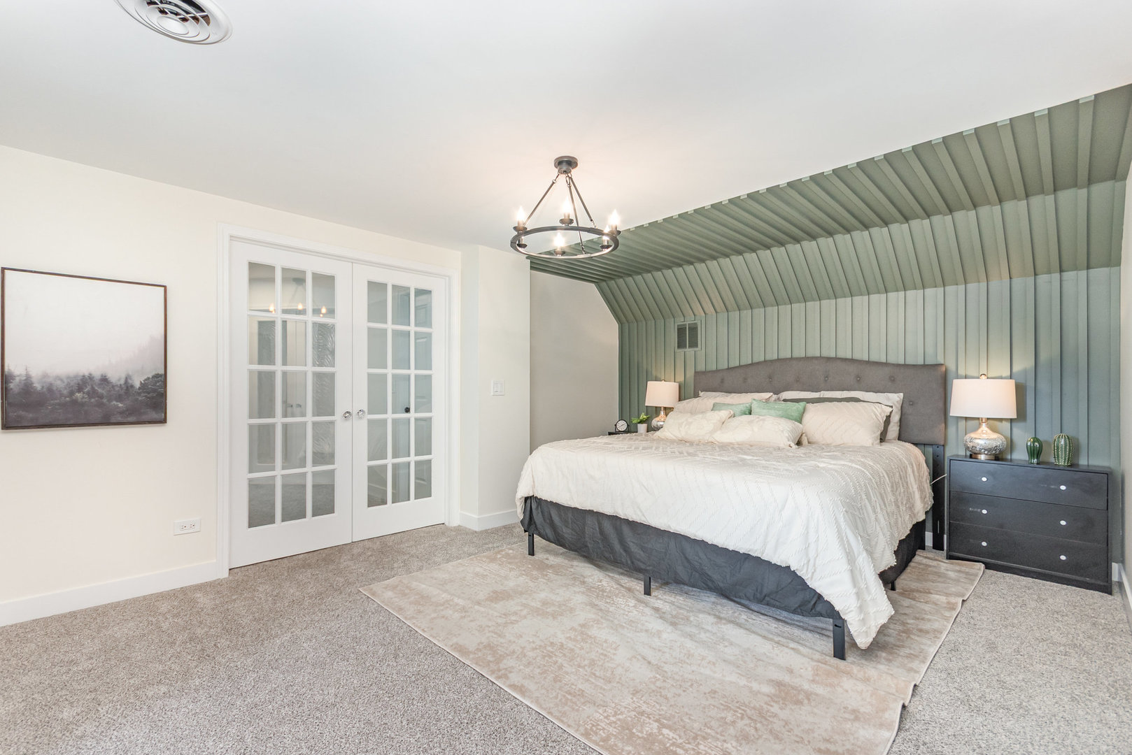 11426 Kluth Drive Mokena, IL 60448 - Photo 7 of 39 a bedroom with a large bed and a chandelier