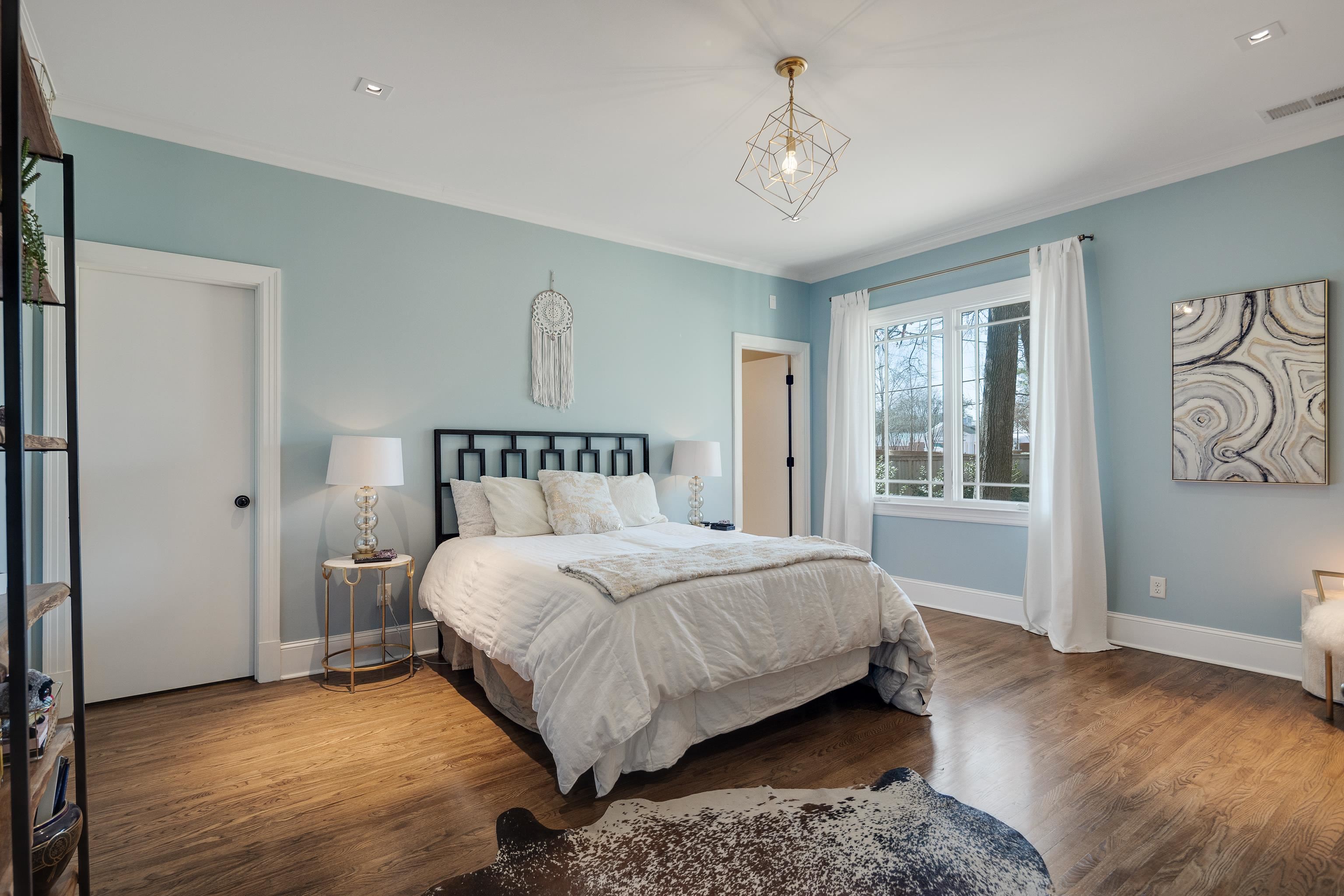 90 North Perkins Road Memphis, TN 38117 - Photo 20 of 25 a bedroom with a bed and a window