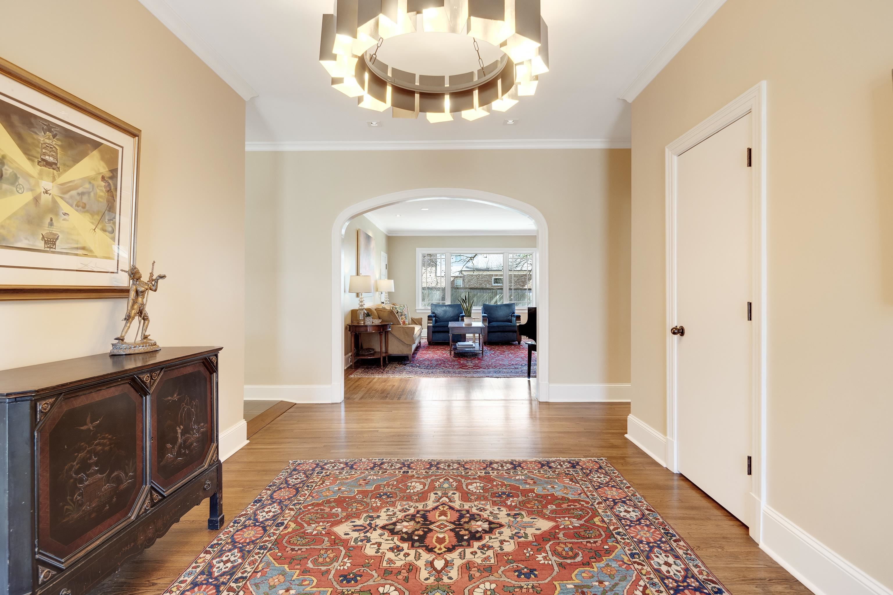90 North Perkins Road Memphis, TN 38117 - Photo 2 of 25 a living room with fireplace furniture and a chandelier