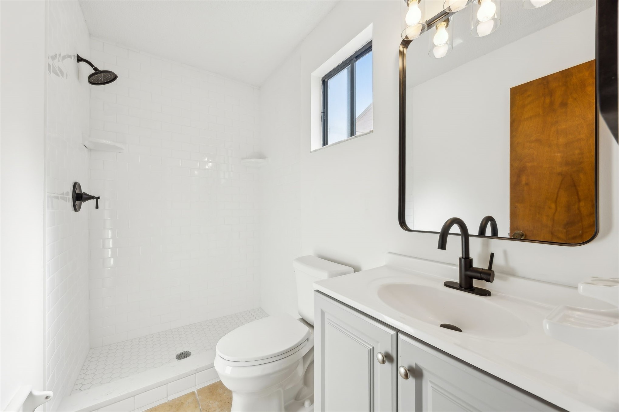 7 Jasmine Place Fernandina Beach, FL 32034 - Photo 10 of 27 a bathroom with a sink a toilet and shower