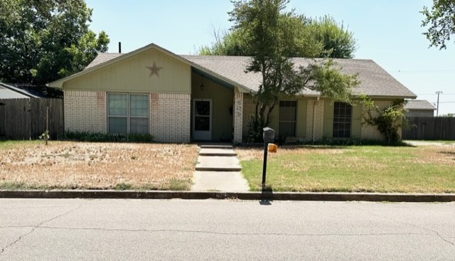 a front view of house with garage