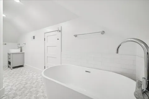 a bathroom with a bathtub