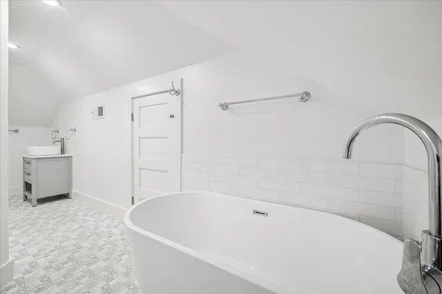 a bathroom with a bathtub