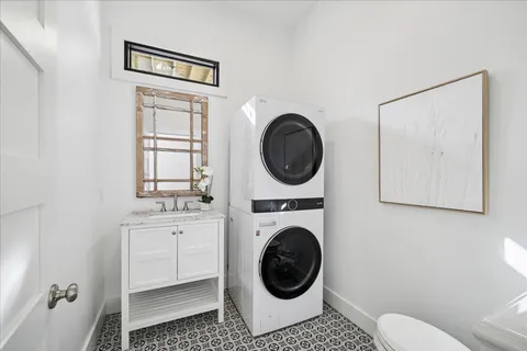 a bathroom with a toilet and a sink