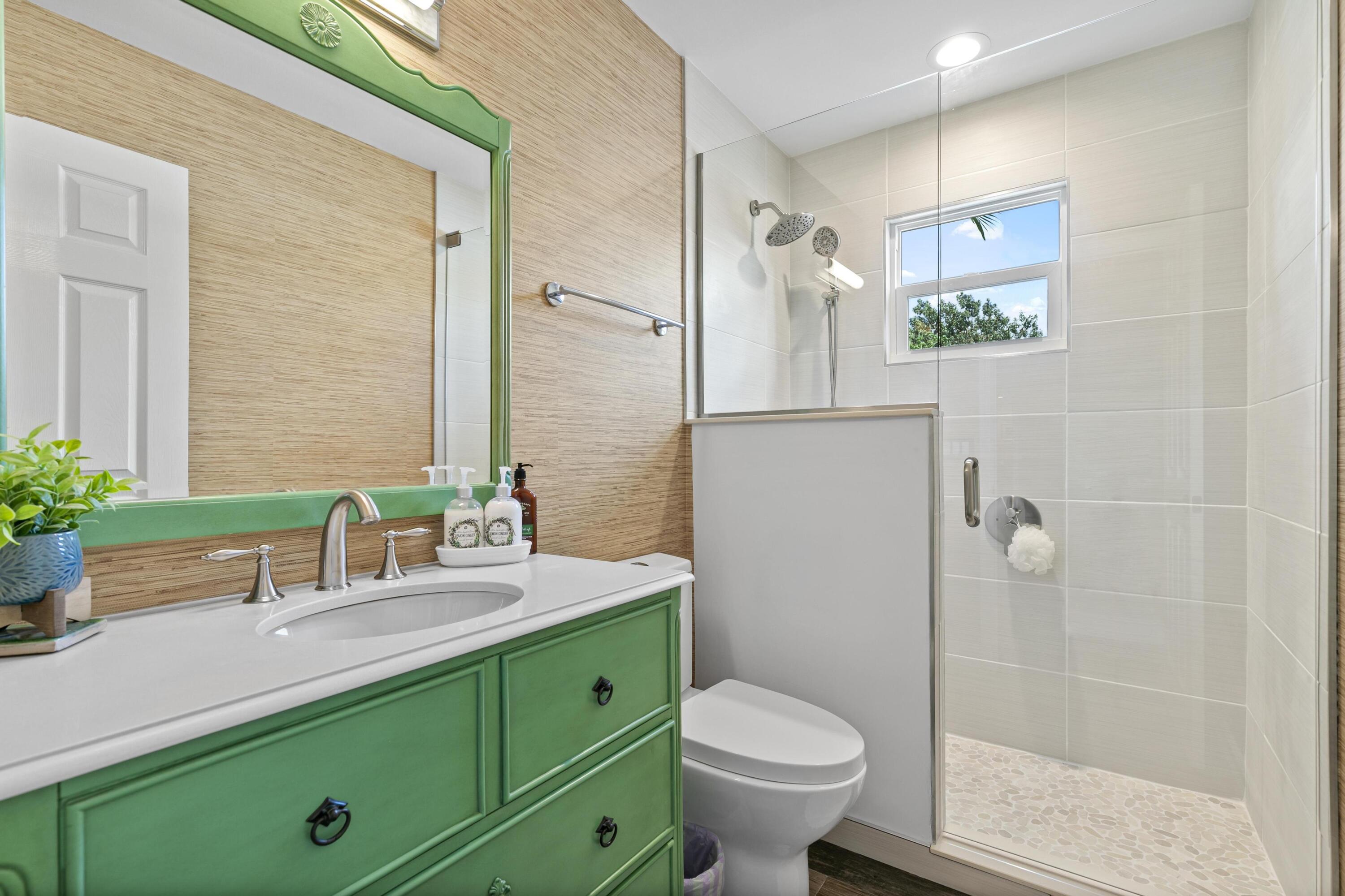 9025 Pomelo Road West Fort Myers, FL 33967 - Photo 11 of 27 a bathroom with a sink and a mirror