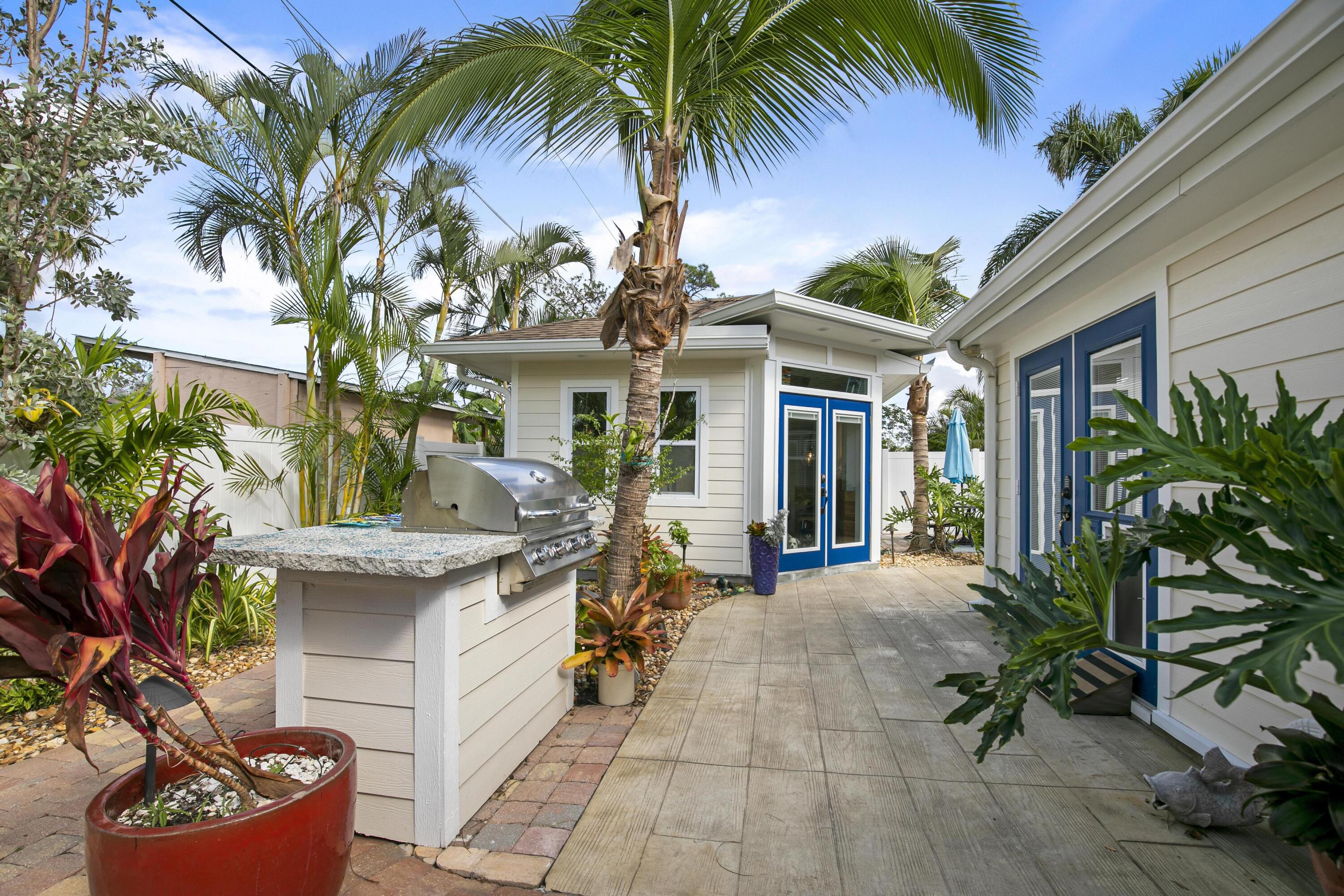 9025 Pomelo Road West Fort Myers, FL 33967 - Photo 18 of 27 a view of a house with backyard and sitting area