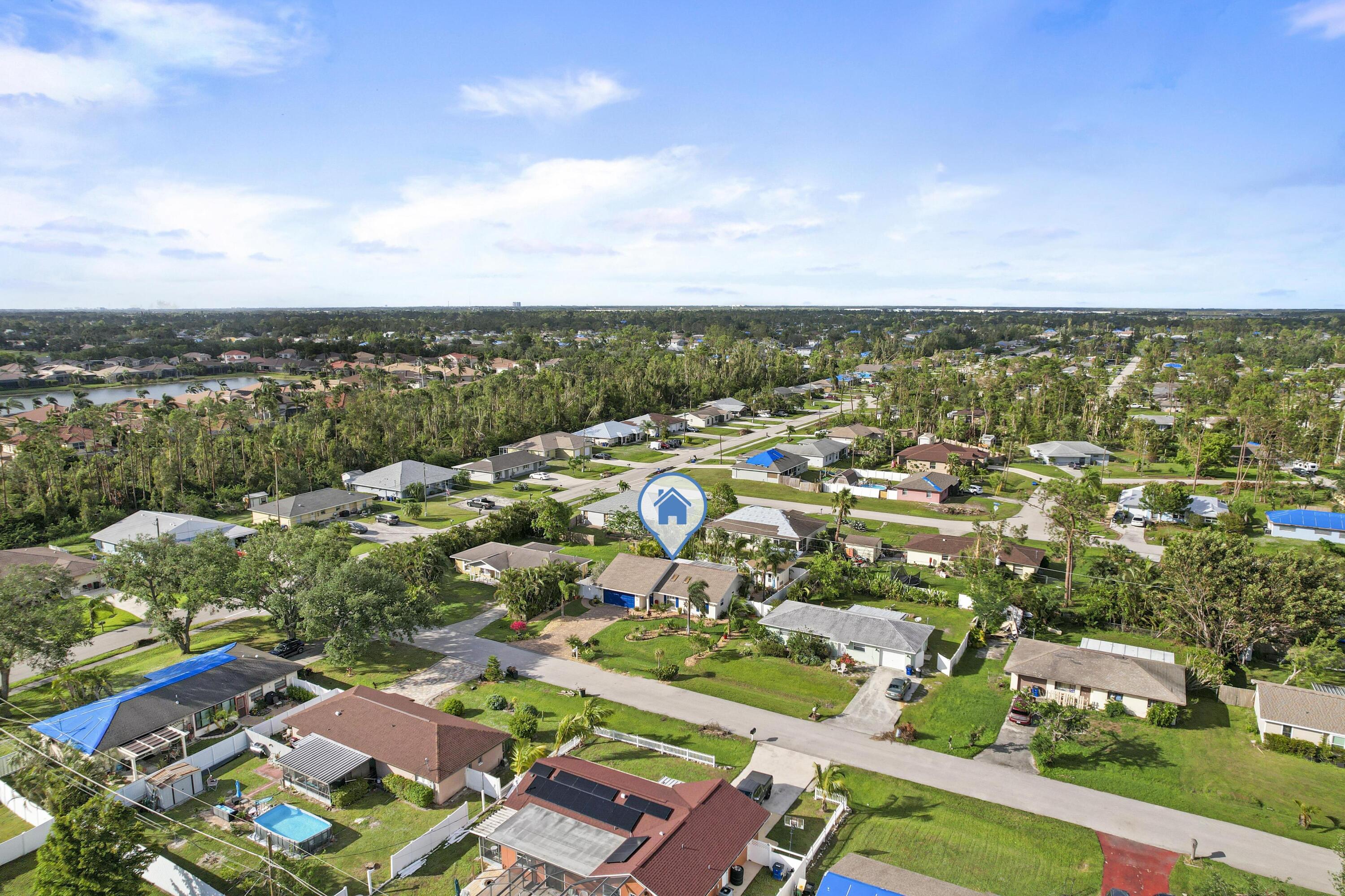 9025 Pomelo Road West Fort Myers, FL 33967 - Photo 24 of 27 an aerial view of residential houses with outdoor space