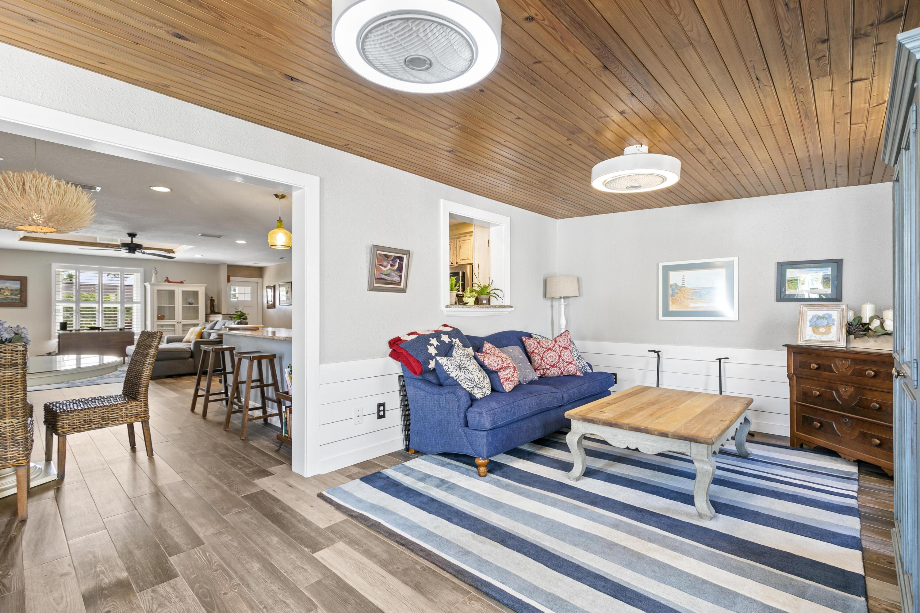9025 Pomelo Road West Fort Myers, FL 33967 - Photo 9 of 27 a living room with furniture and wooden floor