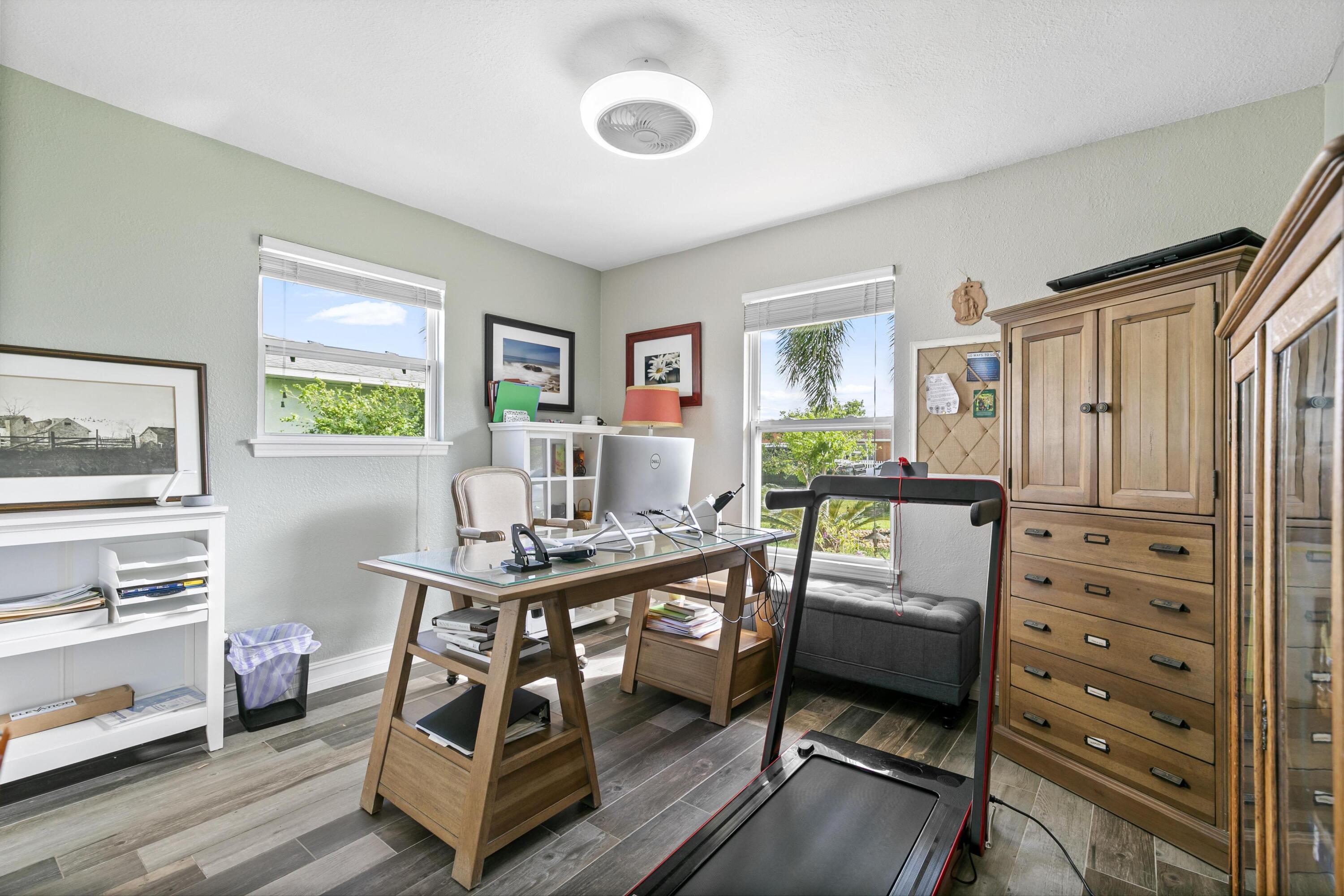 9025 Pomelo Road West Fort Myers, FL 33967 - Photo 10 of 27 a view of a workspace with furniture and a window