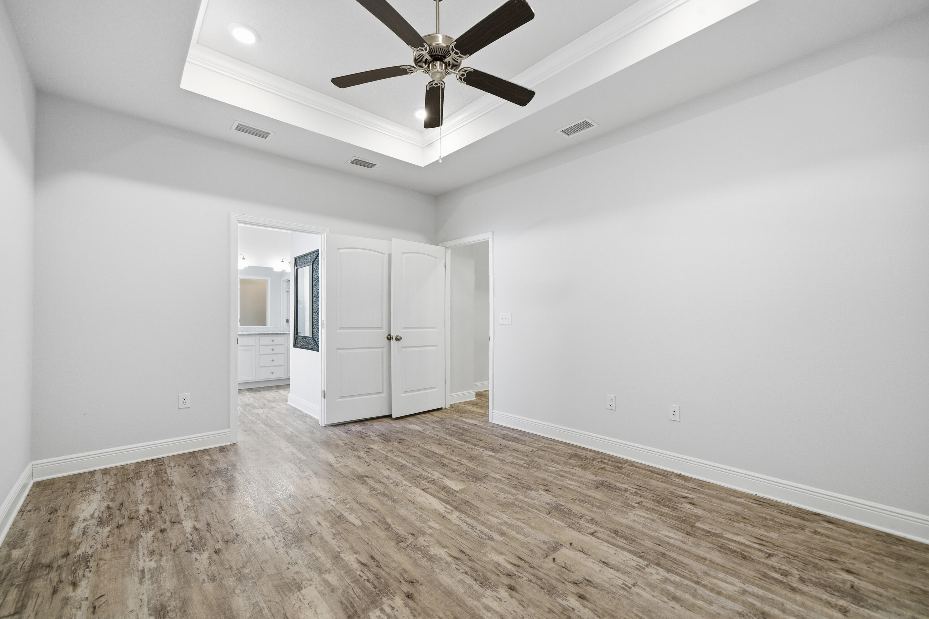 191 Southern Pnes Road Santa Rosa Beach, FL 32459 - Photo 21 of 46 wooden floor in an empty room
