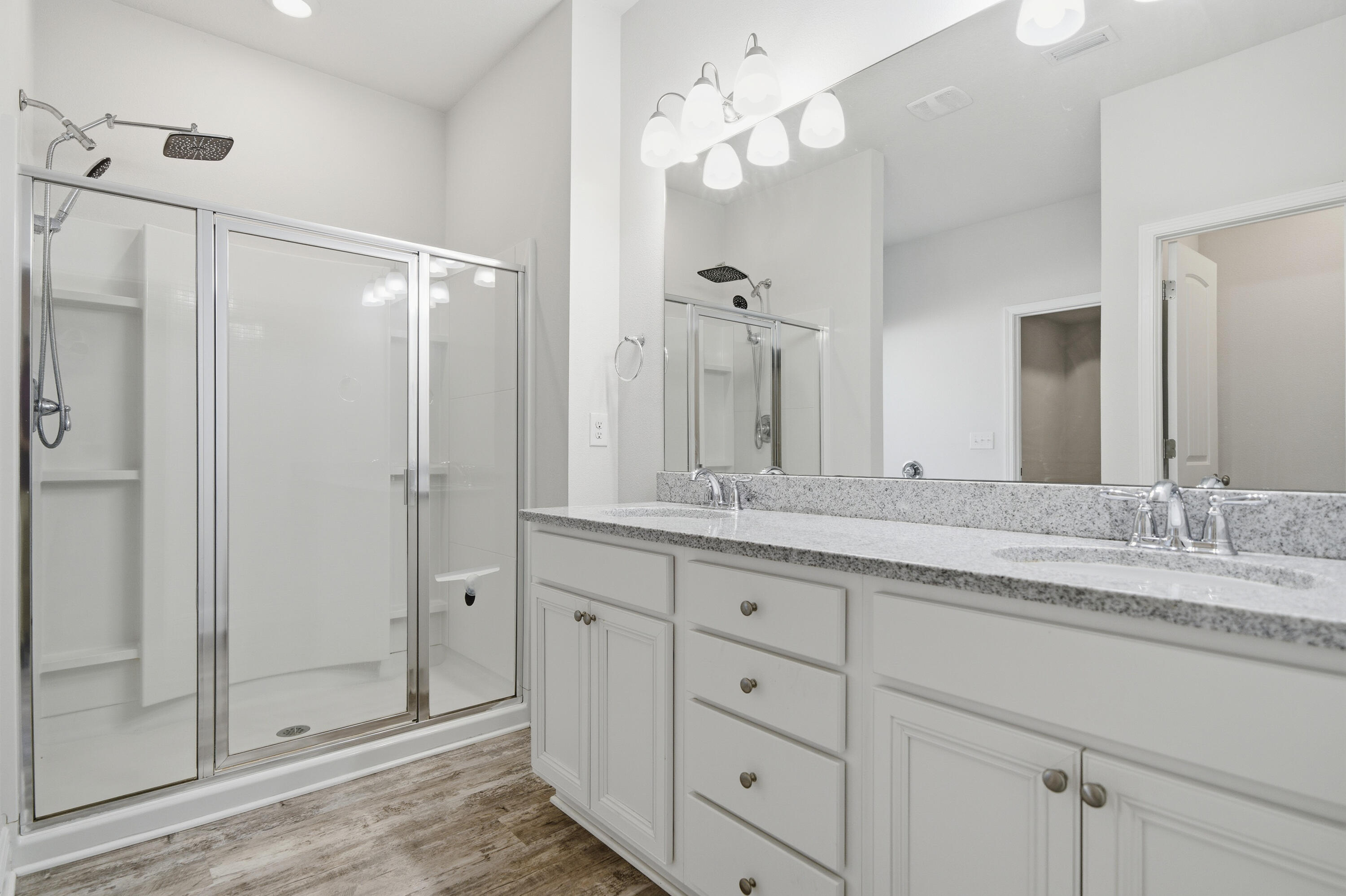 191 Southern Pnes Road Santa Rosa Beach, FL 32459 - Photo 25 of 46 a bathroom with double sink and a mirror