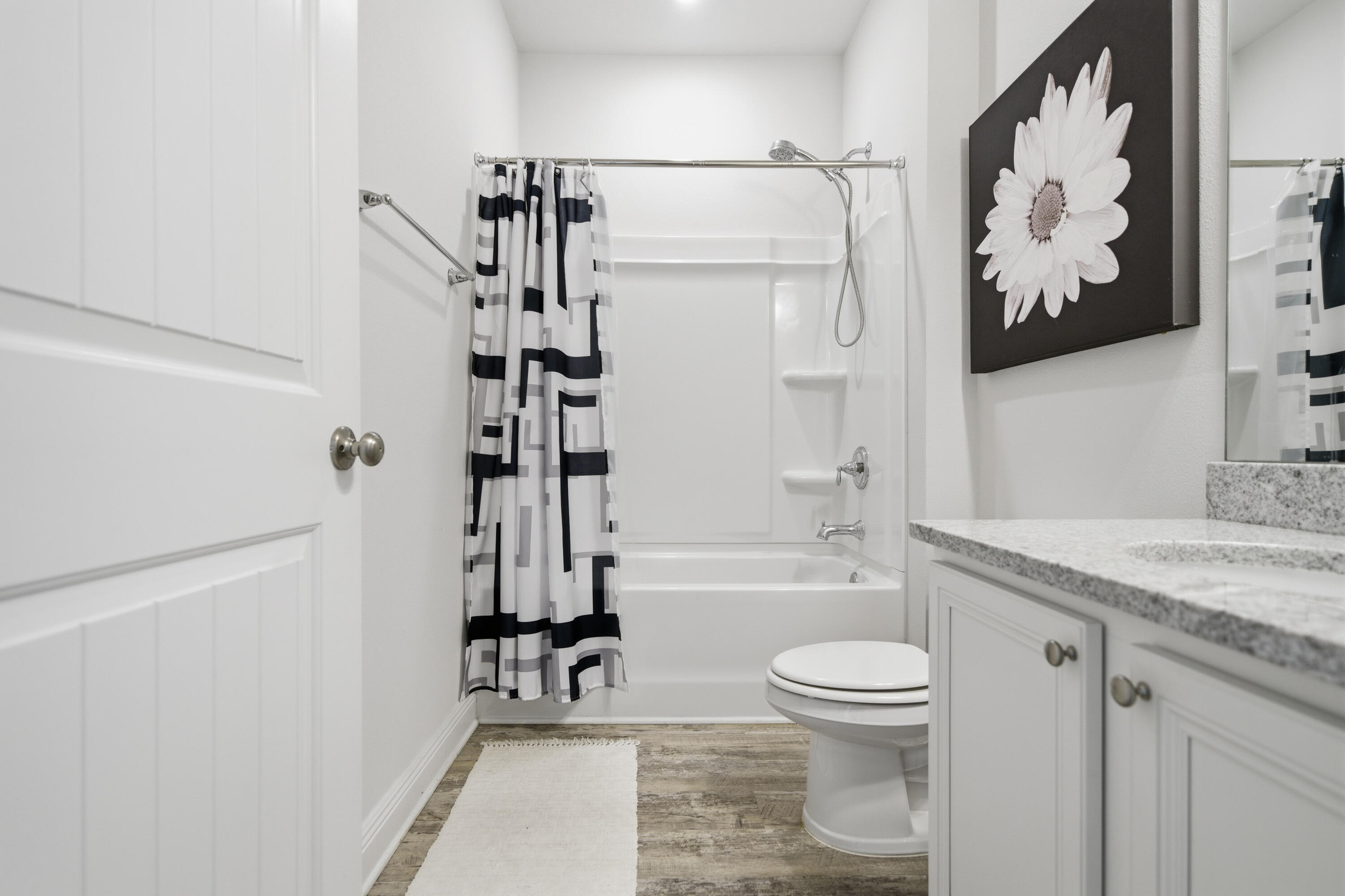 191 Southern Pnes Road Santa Rosa Beach, FL 32459 - Photo 34 of 46 a bathroom with a granite countertop sink toilet and shower