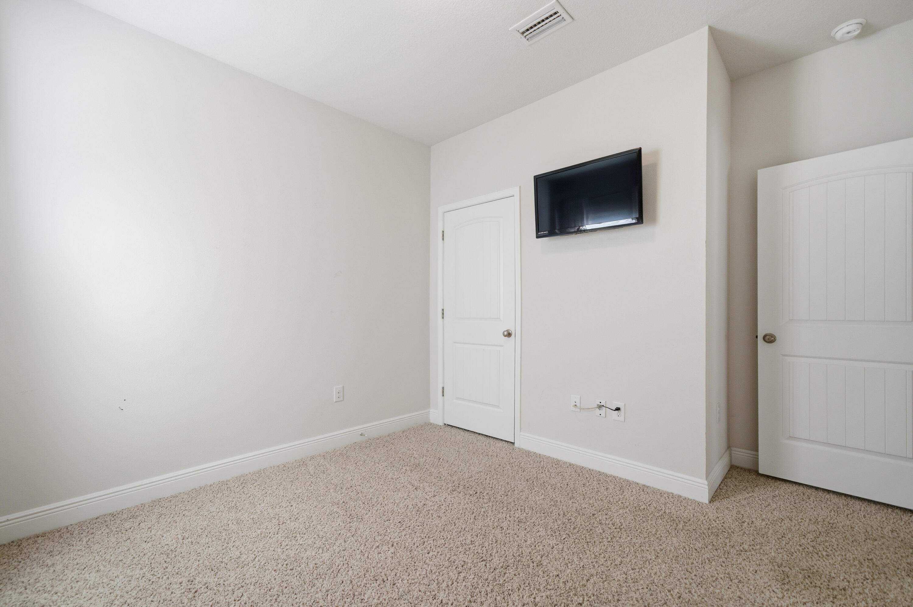 191 Southern Pnes Road Santa Rosa Beach, FL 32459 - Photo 38 of 46 a view of an empty room with wooden floor and a window