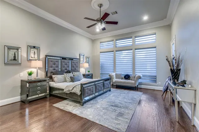 a large bathroom with a large mirror vanity and sink