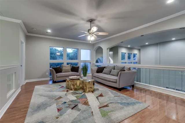 a view of a hallway with livingroom and dining room