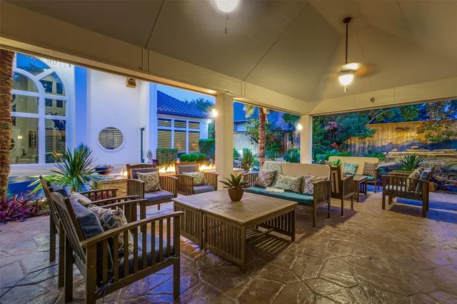 a view of a swimming pool with a lounge chair