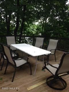 15 Ridge Road Cos Cob, CT 06807 - Photo 8 of 11 a view of a chairs and table in the patio