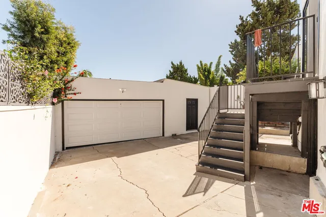 front view of a house with a patio