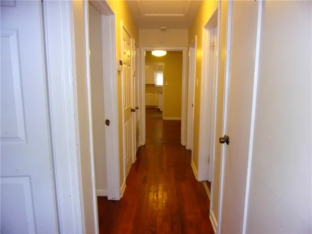 a view of a bathroom from a hallway