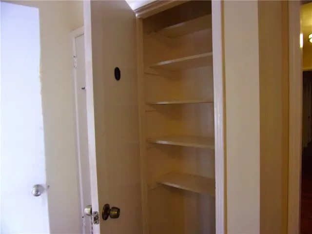 a bathroom with a glass door