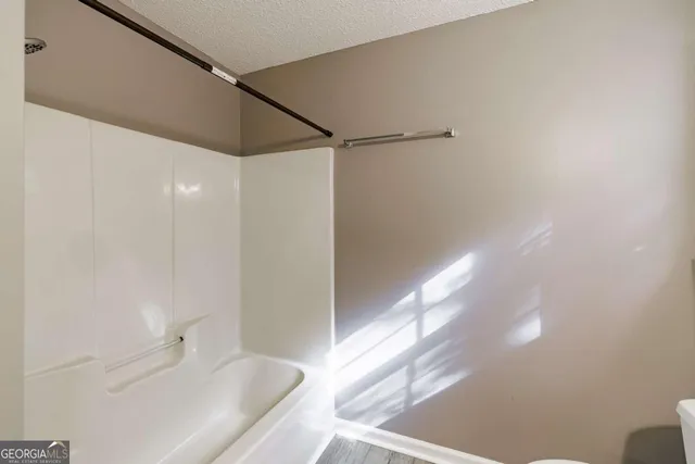 a bathroom with a sink and a large mirror