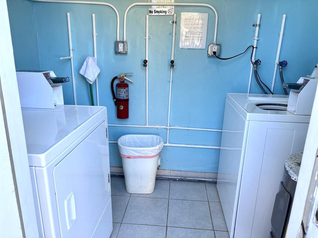 310 South Cypress Road, Unit 701 Pompano Beach, FL 33060 - Photo 23 of 34 - Community laundry