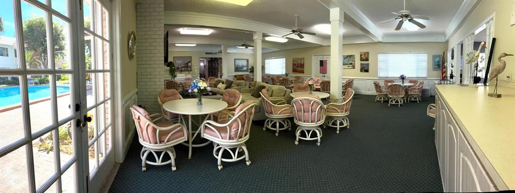 310 South Cypress Road, Unit 701 Pompano Beach, FL 33060 - Photo 26 of 34 Club house by pool