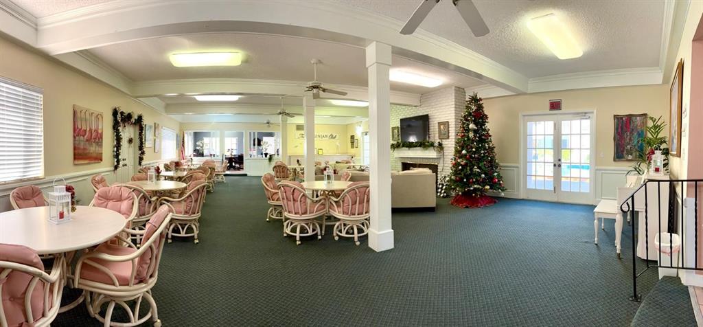 310 South Cypress Road, Unit 701 Pompano Beach, FL 33060 - Photo 29 of 34 Clubhouse decorated during the holidays