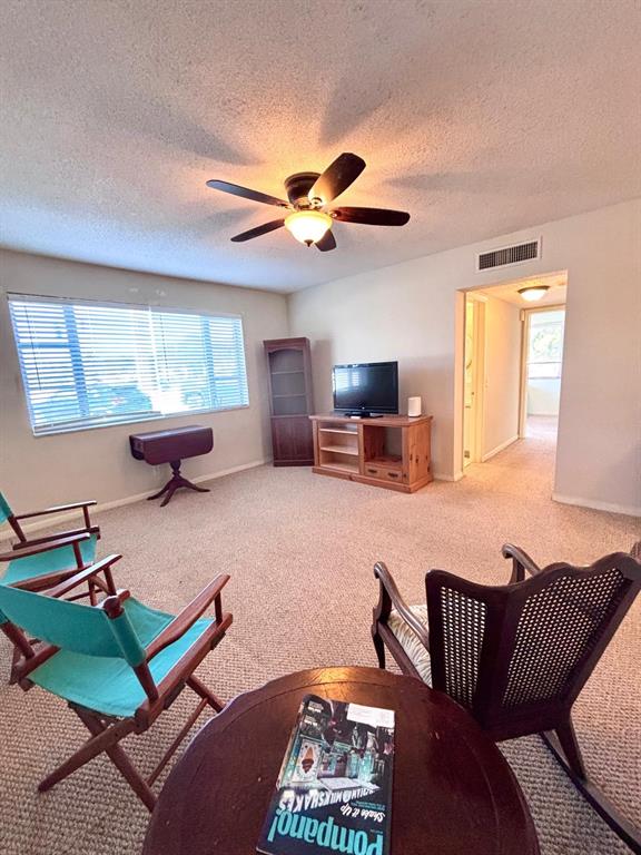 310 South Cypress Road, Unit 701 Pompano Beach, FL 33060 - Photo 7 of 34 - and hallway to bathroom and bedrooms