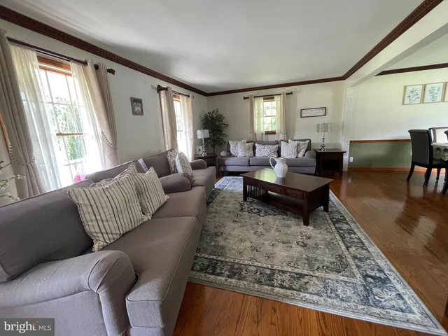 a kitchen with stainless steel appliances a refrigerator sink and microwave