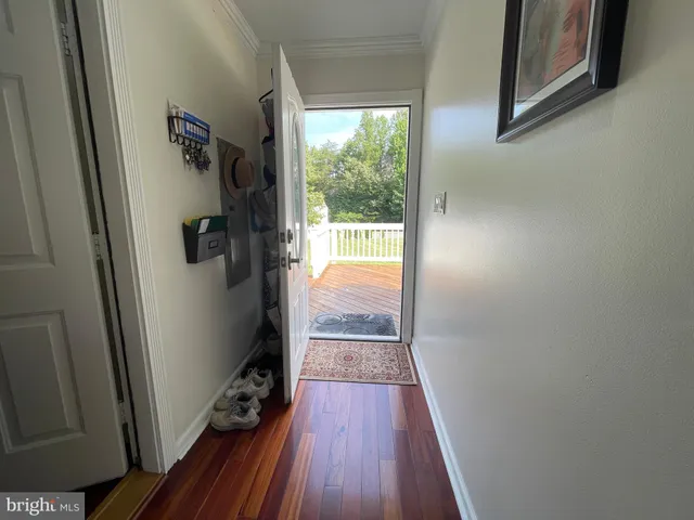 a view of a hallway with entryway