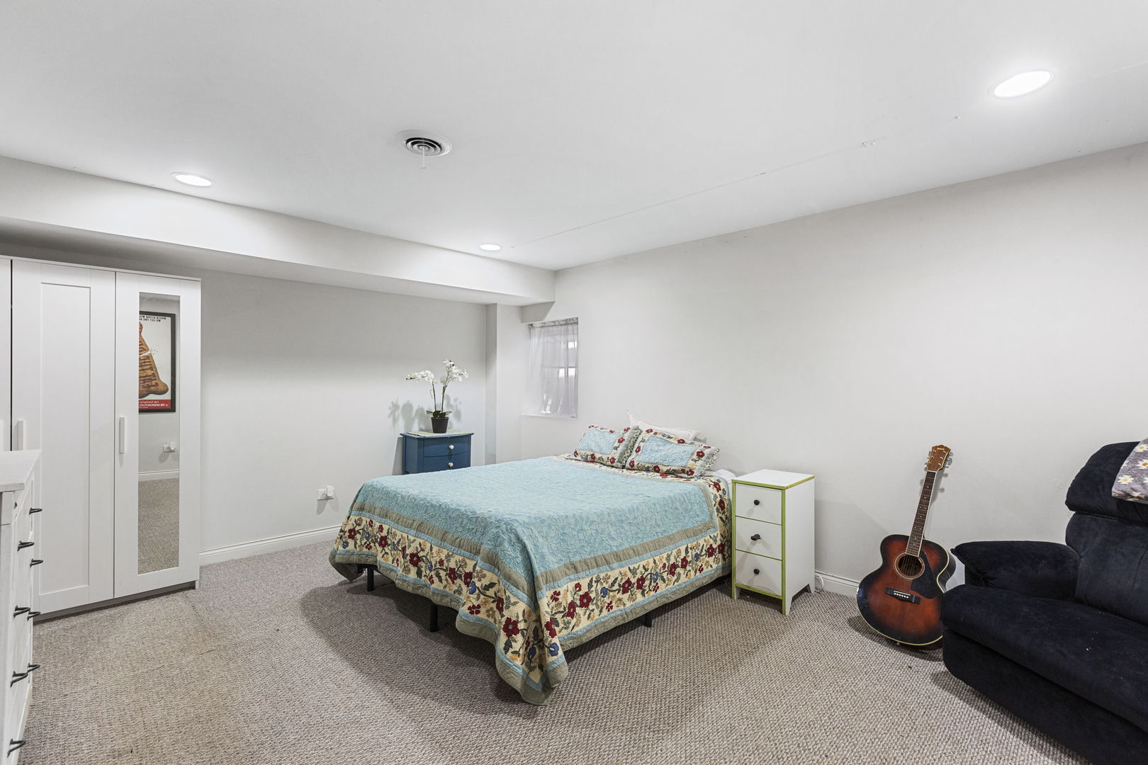 2440 West Course Drive Riverwoods, IL 60015 - Photo 15 of 19 a bedroom with a bed and a couch