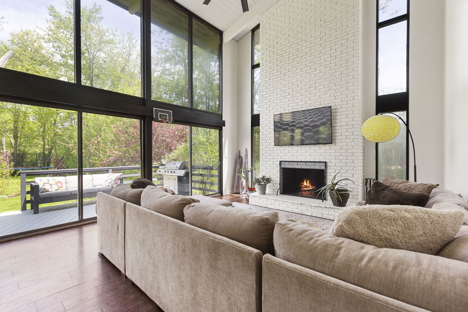 2440 West Course Drive Riverwoods, IL 60015 - Photo 6 of 19 a living room with furniture and a fireplace