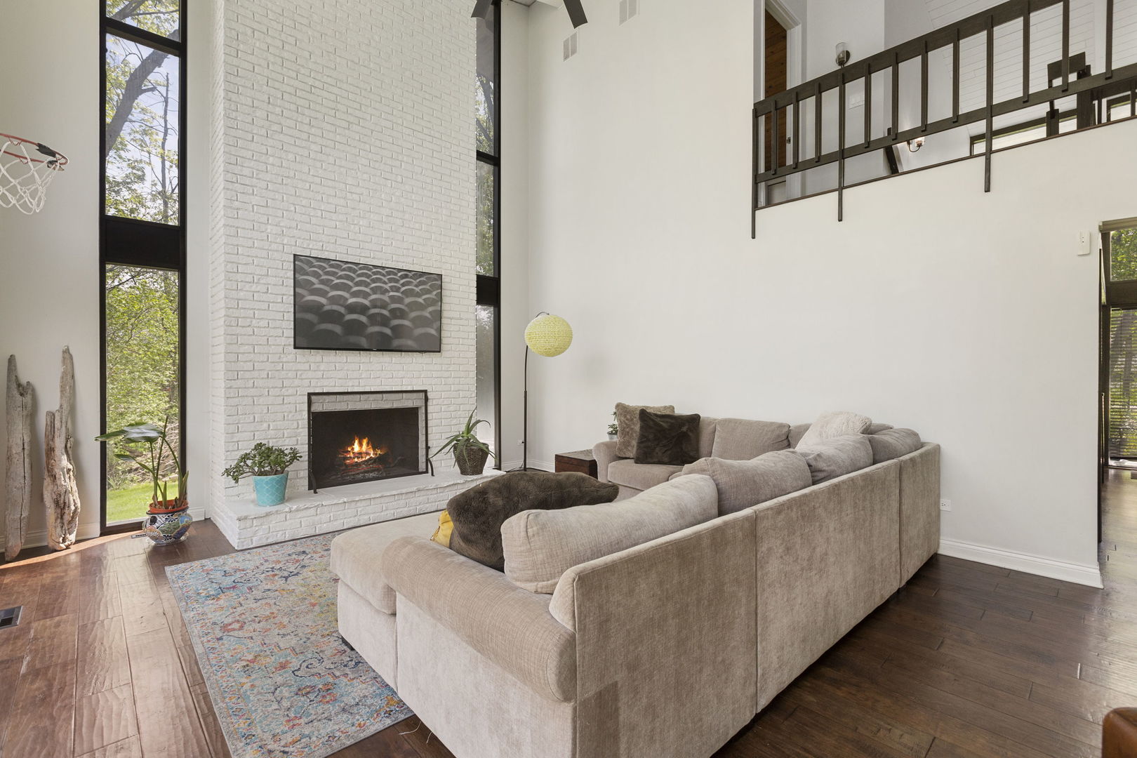 2440 West Course Drive Riverwoods, IL 60015 - Photo 7 of 19 a living room with furniture and a fireplace