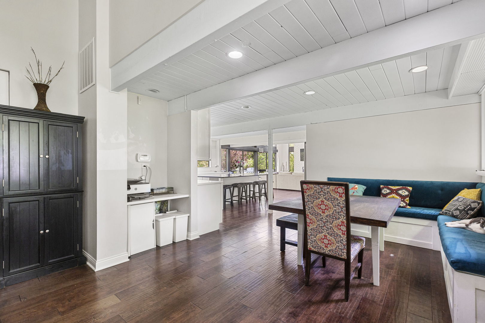 2440 West Course Drive Riverwoods, IL 60015 - Photo 9 of 19 a kitchen with furniture wooden floor and stainless steel appliances
