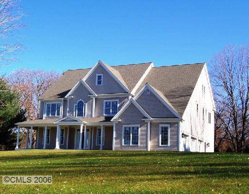 3 Rooster Ridge Road Newtown, CT 06470 - Photo 1 of 1 front view of a house with a big yard