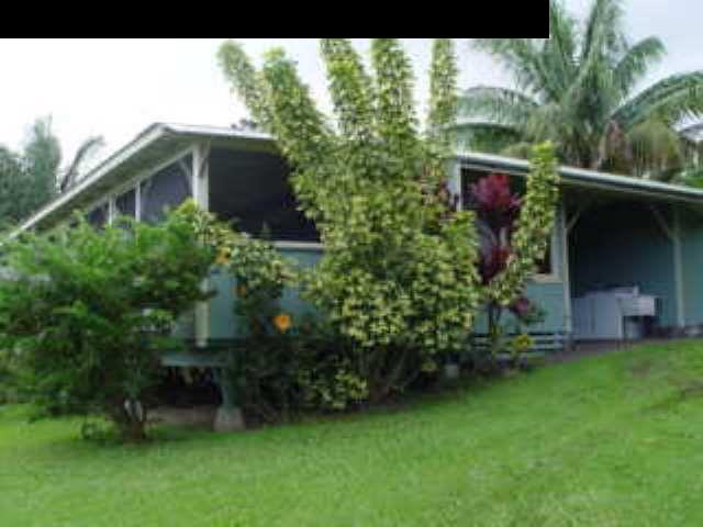 0 Maka'alae Road Hana, HI 96713 - Photo 4 of 8 a front view of a house with a garden