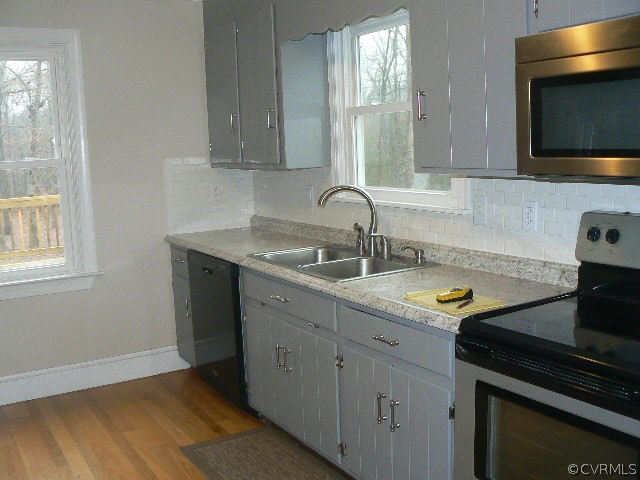 642 Cooks Road Farmville, VA 23901 - Photo 10 of 31 a kitchen with a sink stove and cabinets