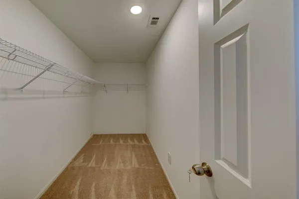 a view of a room with a chandeliers