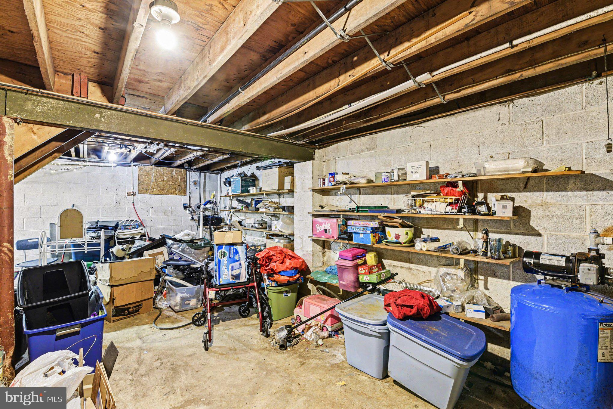 677 Dr Miller Road North East, MD 21901 - Photo 21 of 28 a view of a storage room with a lot of stuff