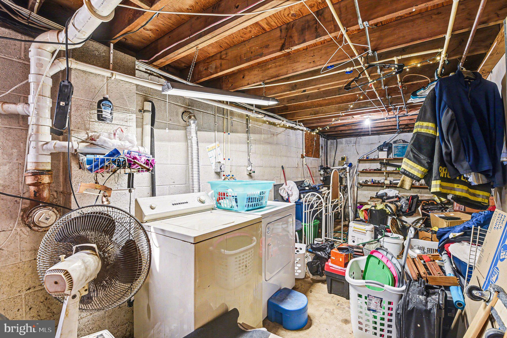 677 Dr Miller Road North East, MD 21901 - Photo 23 of 28 a utility room with dryer washer and other items