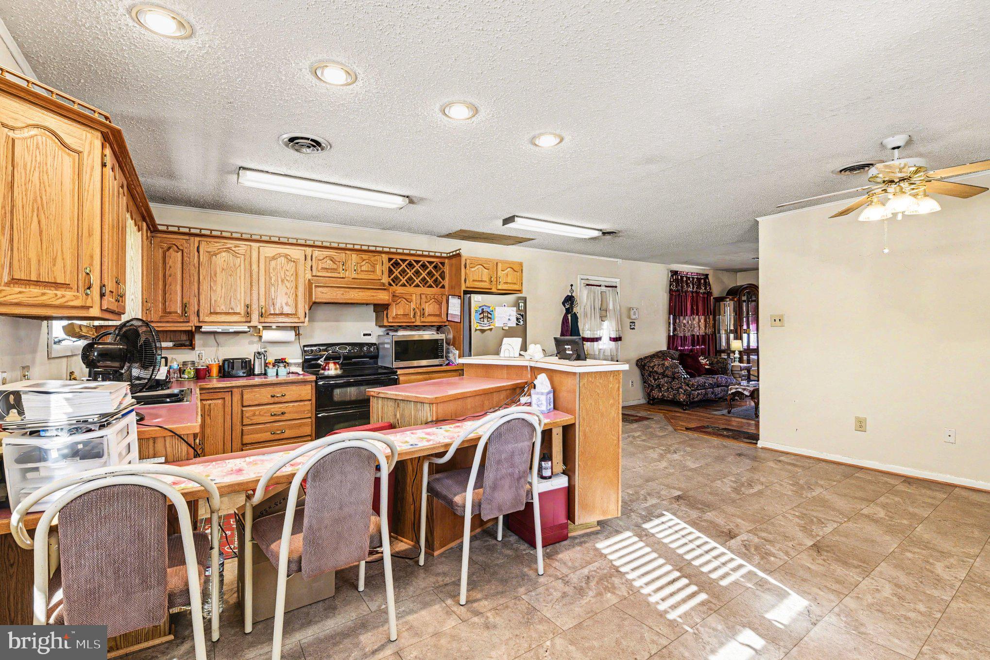 677 Dr Miller Road North East, MD 21901 - Photo 9 of 28 a outdoor space with lots of chairs and mirrors