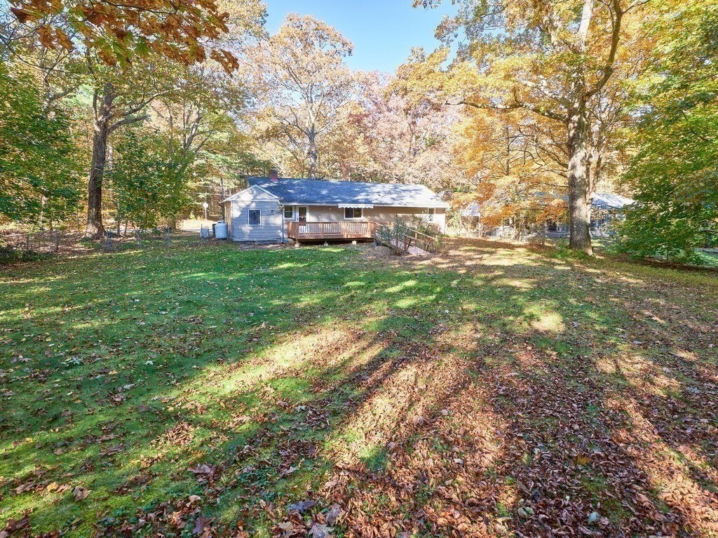 85 Shepard Road Sturbridge, MA 01566 - Photo 20 of 21 a backyard of a house with table and chairs