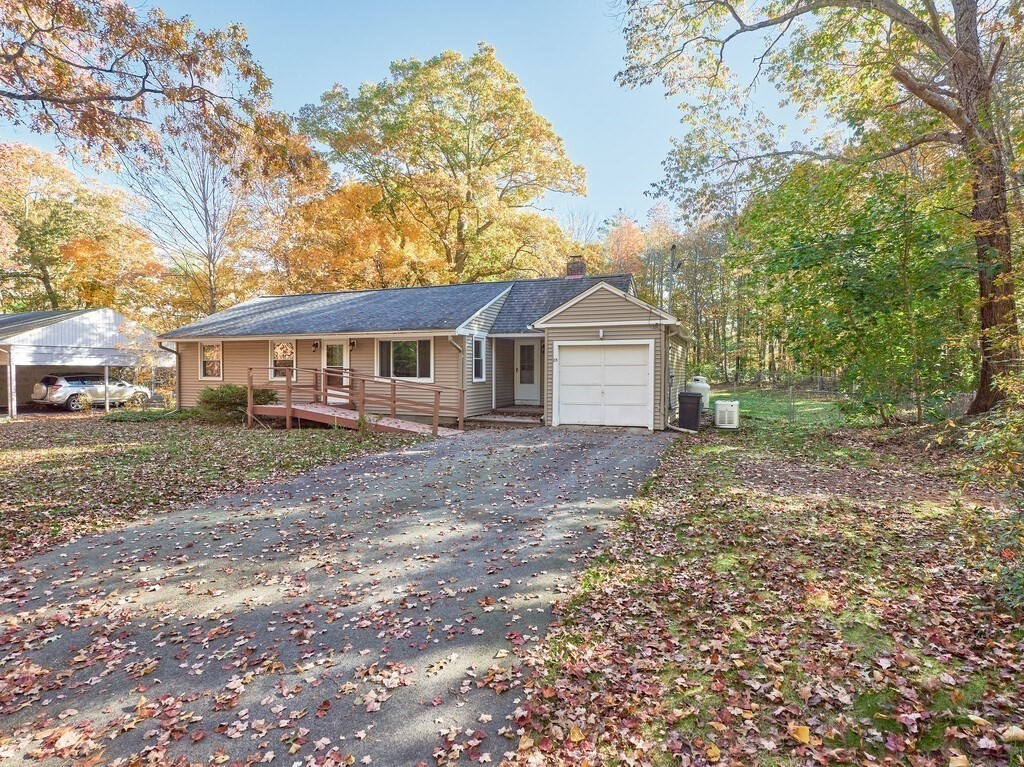 85 Shepard Road Sturbridge, MA 01566 - Photo 5 of 21 a view of a house with a yard