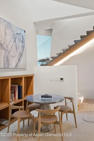 a view of kitchen with furniture and rug