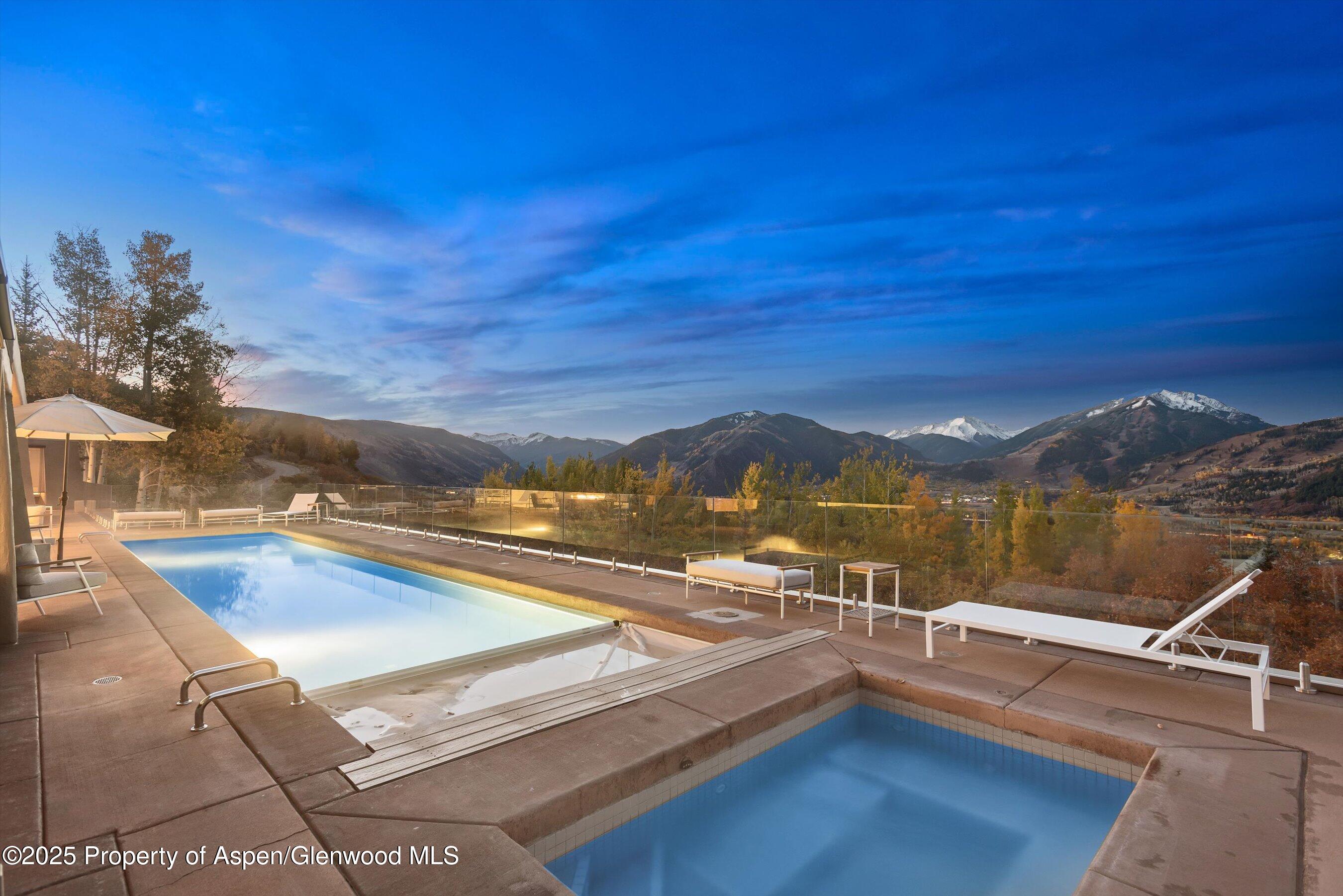 699 Eppley Drive Aspen, CO 81612 - Photo 41 of 45 a view of a lake with a mountain