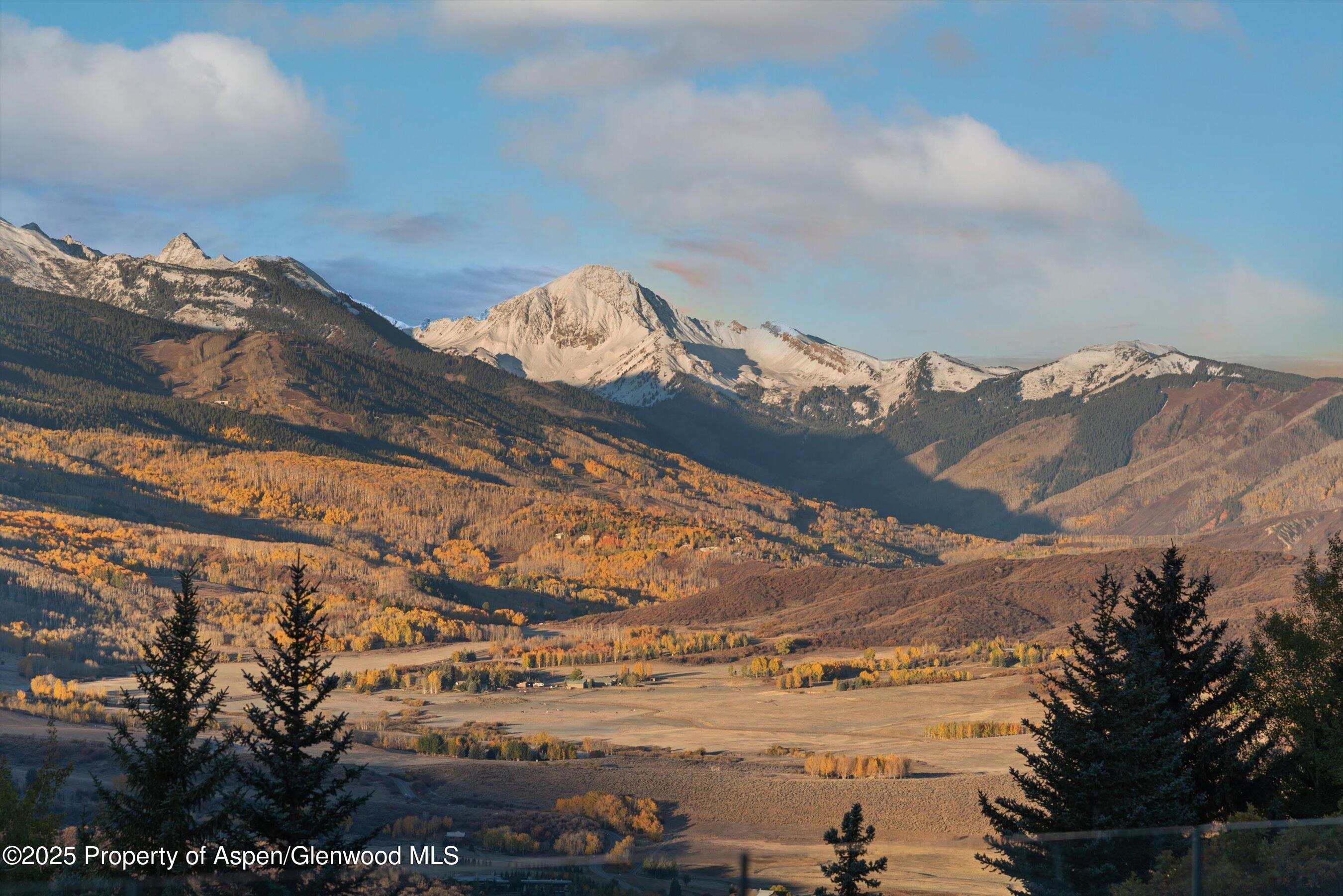 699 Eppley Drive Aspen, CO 81612 - Photo 43 of 45 a view of mountain with sunset